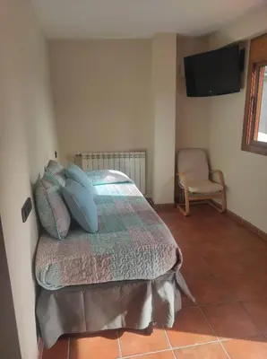Cama o camas de una habitación en Cal Ferrer