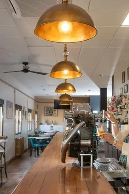 Un restaurante o sitio para comer en Hostal El Trillero