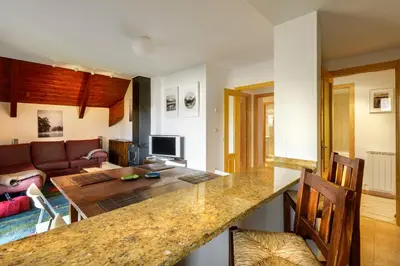 Una televisión o centro de entretenimiento en Apartamento Saliecho 3