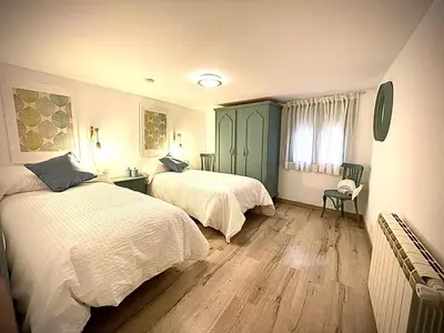 Cama o camas de una habitación en El Refugio del Cierzo