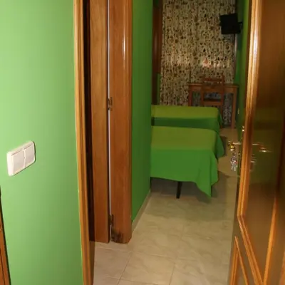 Zona de estar de HOSTAL BURGALES