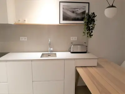 Una cocina o zona de cocina en Acogedor apartamento a pie de pistas cota 1500