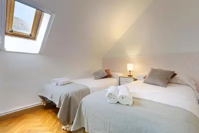 Cama o camas de una habitación en Alojamiento Mundarrey Bïescas