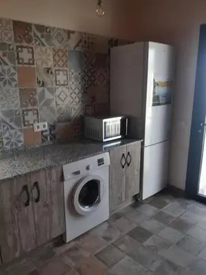 Una cocina o zona de cocina en Apartamentos Hiberus Flumen