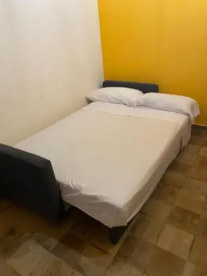 Cama o camas de una habitación en Apartamentos Hiberus Flumen