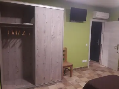 Una televisión o centro de entretenimiento en Apartamentos Hiberus Flumen