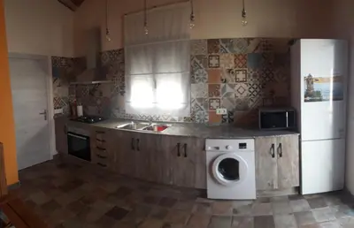 Una cocina o zona de cocina en Apartamentos Hiberus Flumen