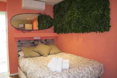 Cama o camas de una habitación en Apartamenticos San Pablo I
