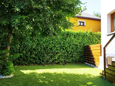 Jardín al aire libre en Villa San Lure Jaca