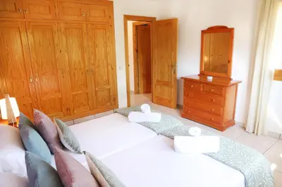 Cama o camas de una habitación en Villa San Lure Jaca