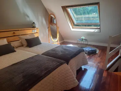 Cama o camas de una habitación en Acogedor y cálido apartamento con vistas a la montaña