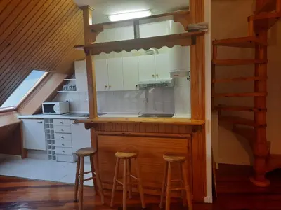 Una cocina o zona de cocina en Acogedor y cálido apartamento con vistas a la montaña