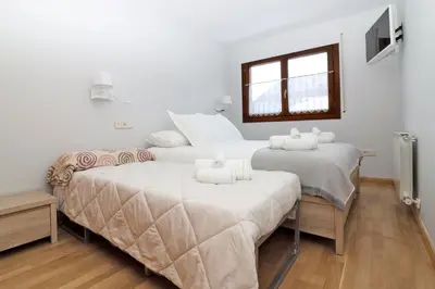 Cama o camas de una habitación en Apartamento Besiberri Vielha