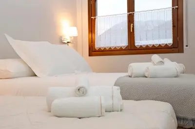 Cama o camas de una habitación en Apartamento Besiberri Vielha