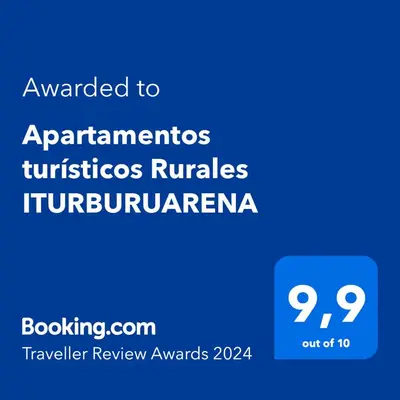 Certificado, premio, señal o documento que está expuesto en Apartamentos turísticos Rurales ITURBURUARENA