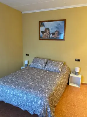 Cama o camas de una habitación en Habitatge d'ús turístic Lo Cresol