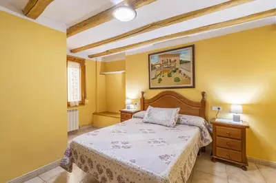 Cama o camas de una habitación en Casa Rural Teulé