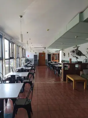 Un restaurante o sitio para comer en HOTEL RURAL El ZAMACÉN