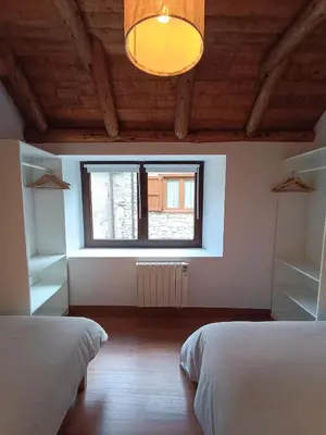 Cama o camas de una habitación en Arties Centro 2 habitaciones, exclusivo familias