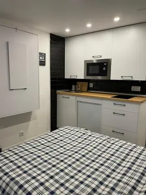 Una cocina o zona de cocina en Baqueira 1500 (pie pista). Edificio Bonaigüa