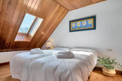Cama o camas de una habitación en Casa Honoria amplio, con vistas y parking - Arafita Apartamentos