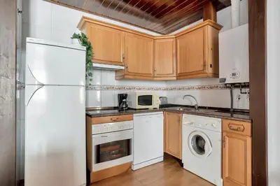 Una cocina o zona de cocina en Casa Honoria amplio, con vistas y parking - Arafita Apartamentos