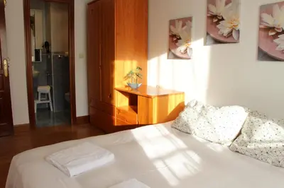 Cama o camas de una habitación en Casa Honoria amplio, con vistas y parking - Arafita Apartamentos