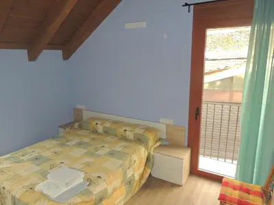 Cama o camas de una habitación en Casa Rural Sardas 60m2 con GARAGE - Sabiñanigo