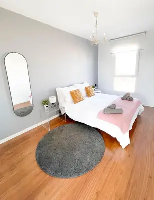 Cama o camas de una habitación en Ático mejores vistas al Pilar jacuzzi y garaje