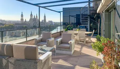 Un balcón o terraza de Ático mejores vistas al Pilar jacuzzi y garaje