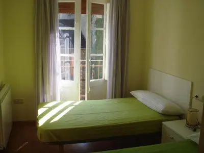 Cama o camas de una habitación en Apartamentos Valles