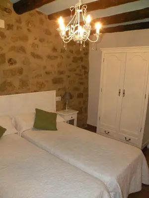 Cama o camas de una habitación en Casas Rural Calaceite