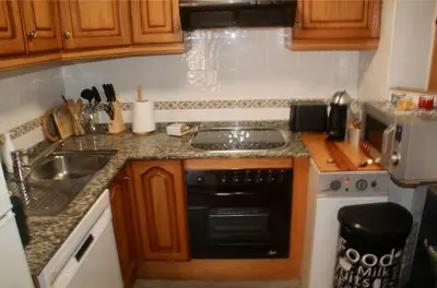Una cocina o zona de cocina en CHECK-IN CASAS Luana