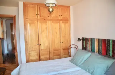 Cama o camas de una habitación en CHECK-IN CASAS Luana