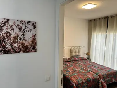Cama o camas de una habitación en APARTAMENTO ROMELIA 1ºa