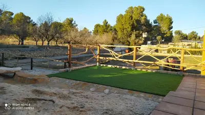 Jardín al aire libre en Casa con vistas, piscina y animales de granja, LA CASETA