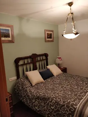 Cama o camas de una habitación en CASA RURAL EL CAIDERÓN