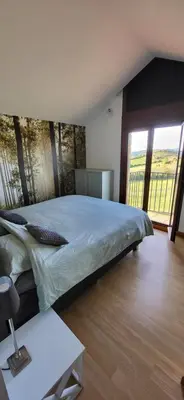 Cama o camas de una habitación en La Cabra Trepadora