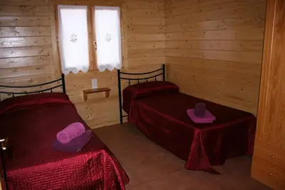 Cama o camas de una habitación en Bungalows Laspaúles