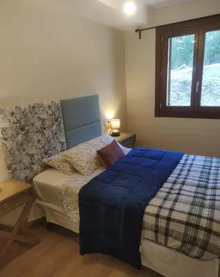 Cama o camas de una habitación en Apartamento a estrenar en Villanúa