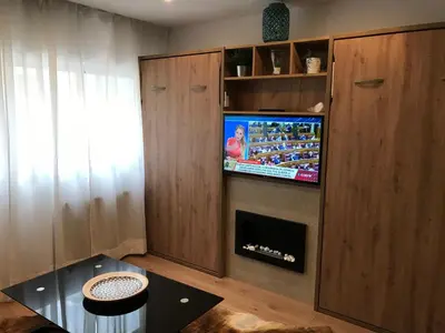 Una televisión o centro de entretenimiento en APARTAMENTO EN CANFRANC ESTACION