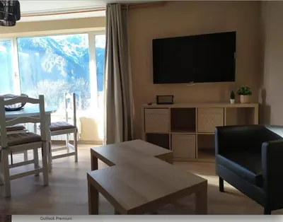 Una televisión o centro de entretenimiento en CHECK-IN CASAS El rinconet