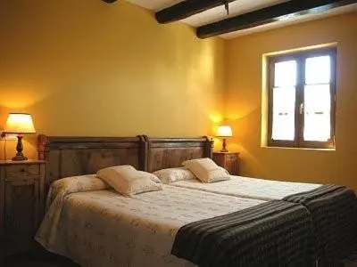 Cama o camas de una habitación en Apartamentos Rurales Kastonea