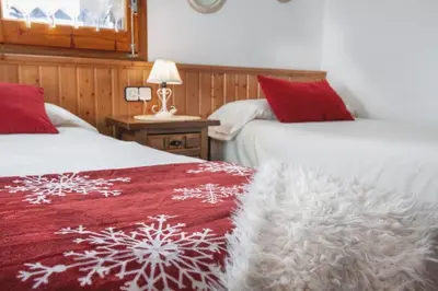 Cama o camas de una habitación en LA GINESTA 1, Apartaments de munyanya