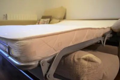 Cama o camas de una habitación en Apartament acollidor amb una gran llar de foc by RURAL D'ÀNEU