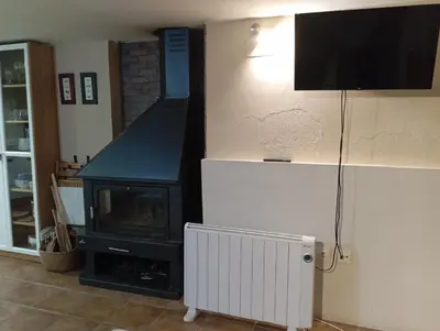 Una televisión o centro de entretenimiento en Casa el Sereno