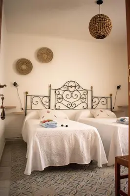 Cama o camas de una habitación en Casa rural Biota