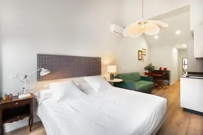 Cama o camas de una habitación en Okako Apartments Tudela