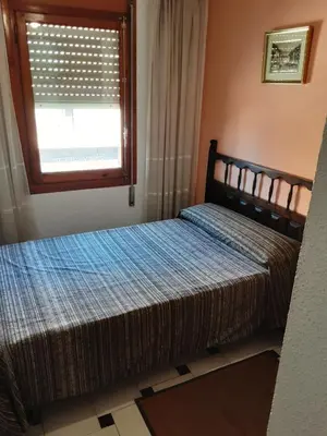 Cama o camas de una habitación en Hostal El Molino