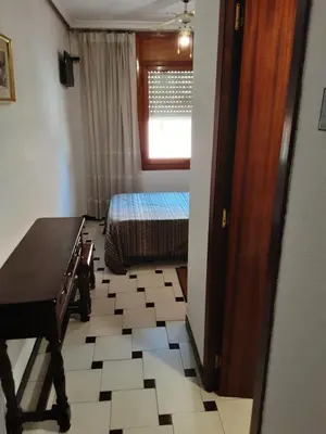 Cama o camas de una habitación en Hostal El Molino